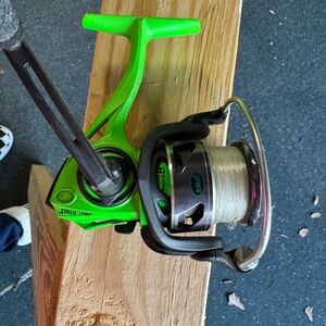 Green and Black Lews Fishing Reel